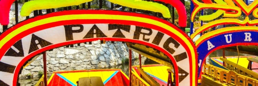 The clorful boats on ancient Aztec canals at Xochimilco in Mexico City